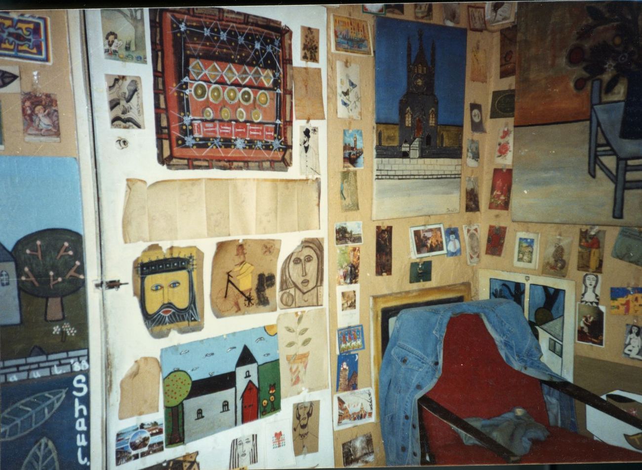 A room in Terry Shaul’s cottage, walls covered in his drawings